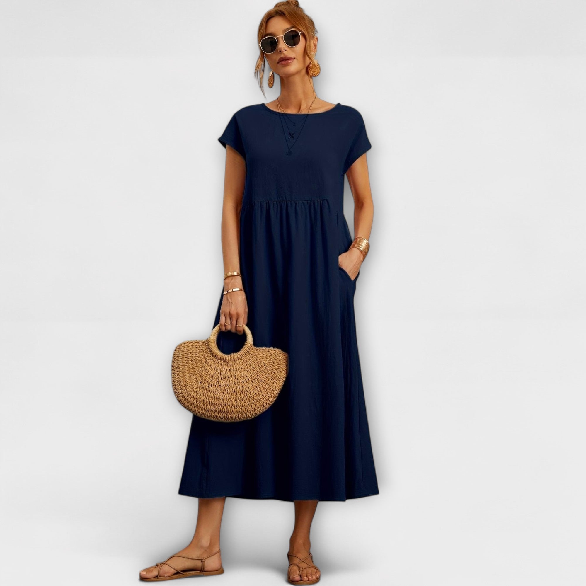 Magnolia | Robe midi avec poches et coupe décontractée