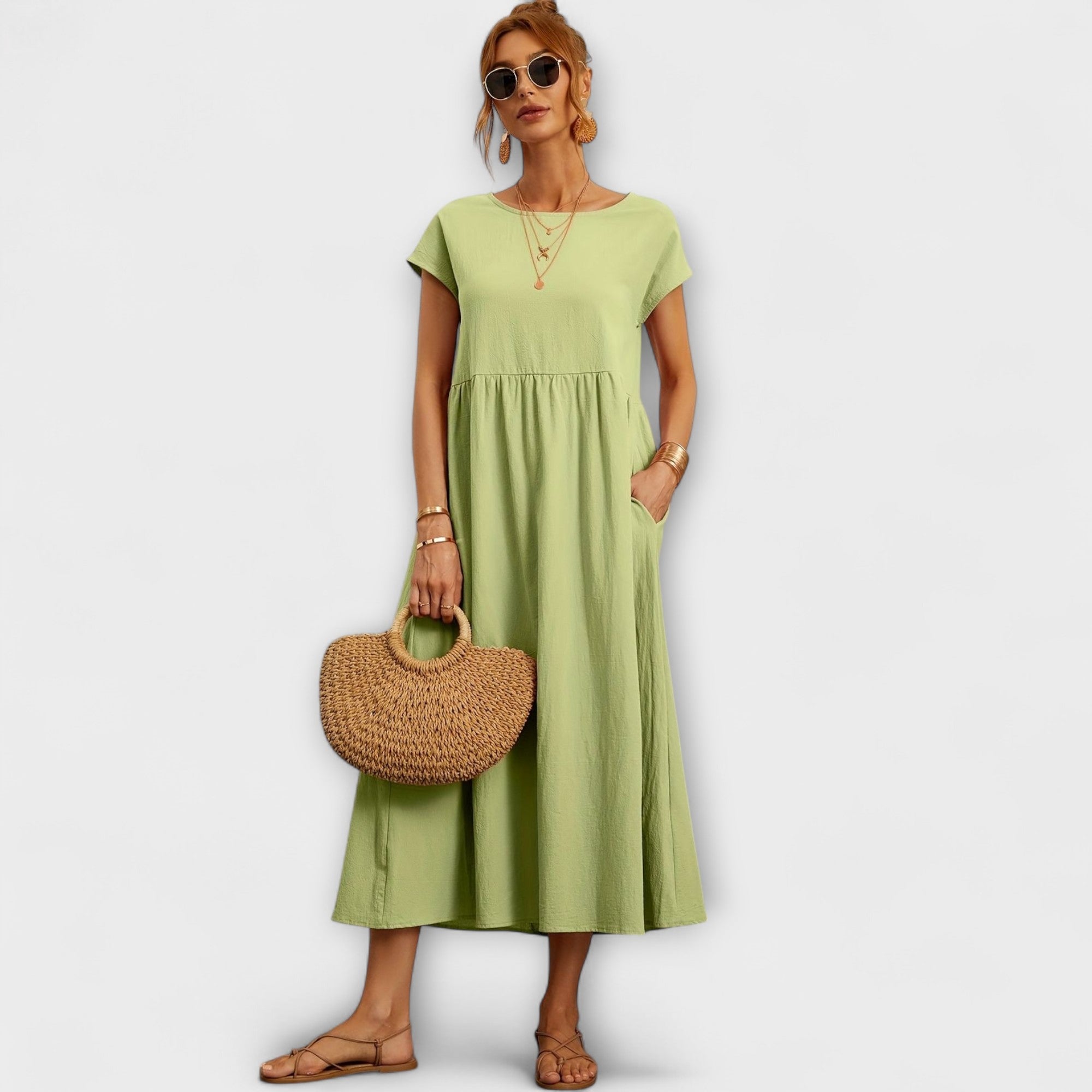 Magnolia | Robe midi avec poches et coupe décontractée